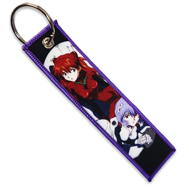 "Anime-themed woven keychain with detailed character designs"