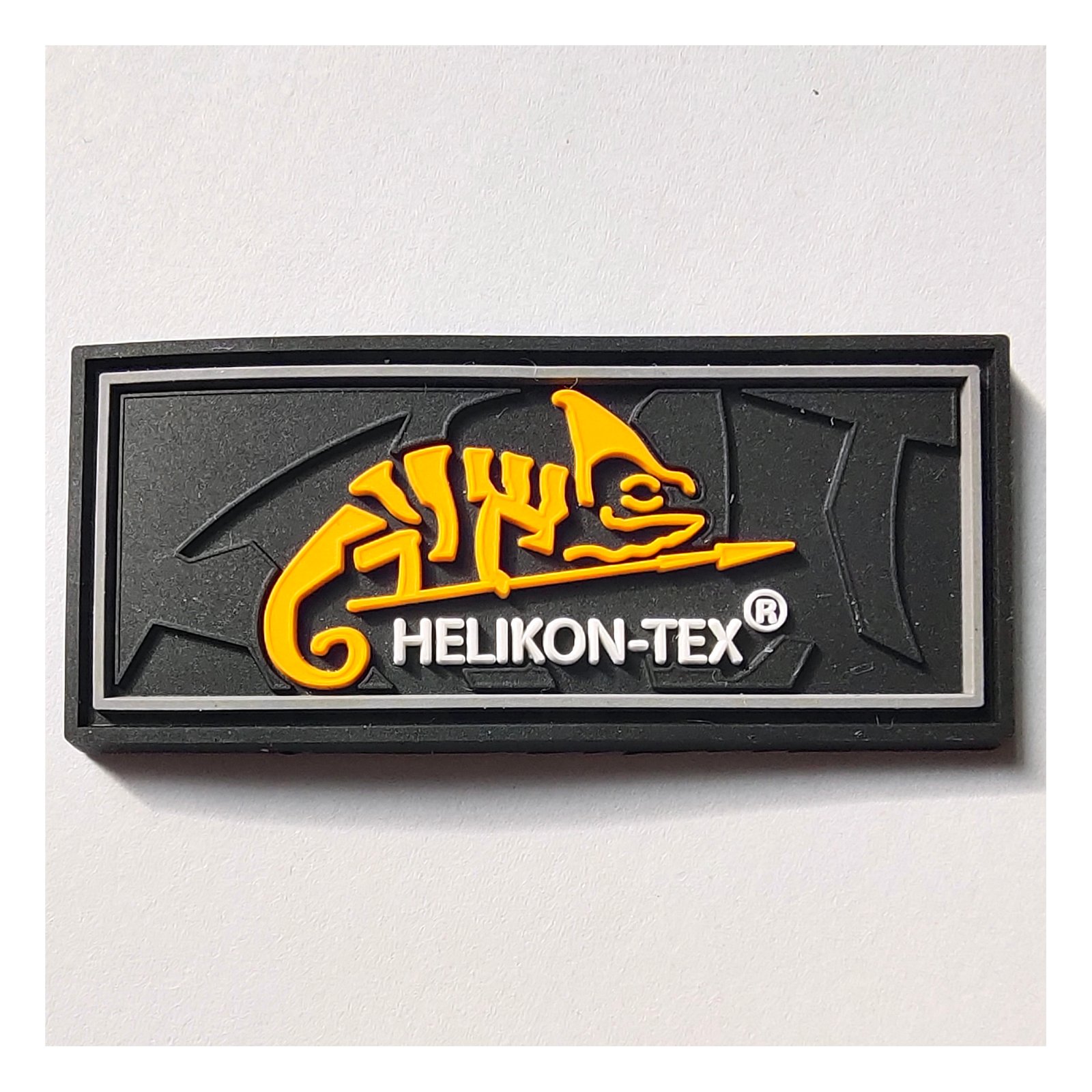 Custom PVC patch with Helikon-Tex logo in black and yellow