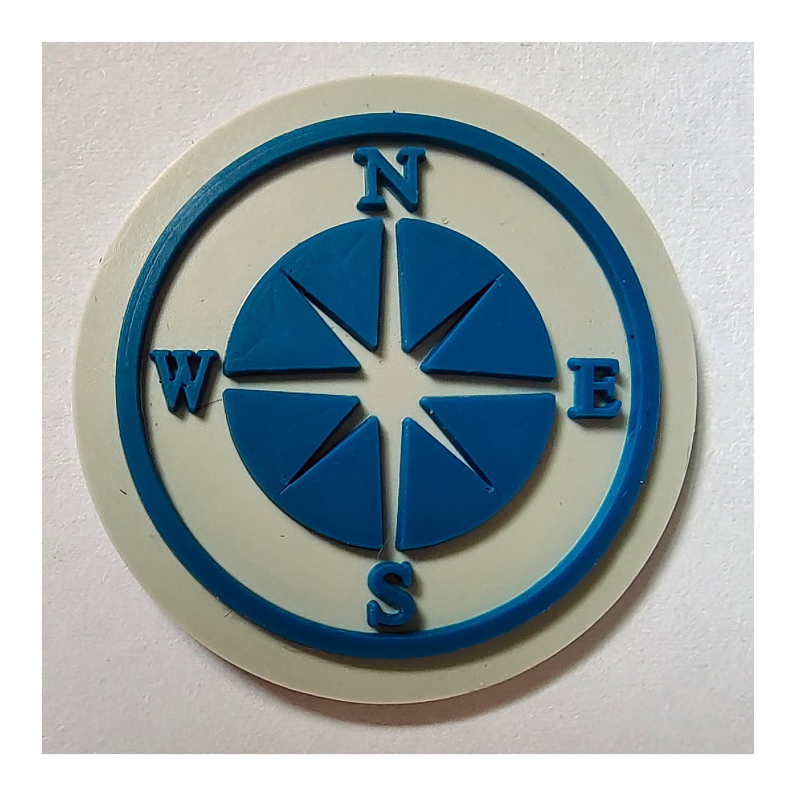 Custom PVC patch with compass design in blue and white