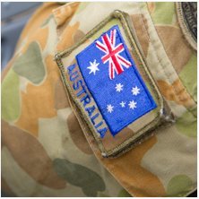"Australian Flag Patch on Camouflage Uniform"