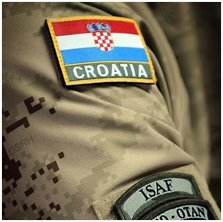 "Detailed Flag Patch on Military Camouflage Jacket"