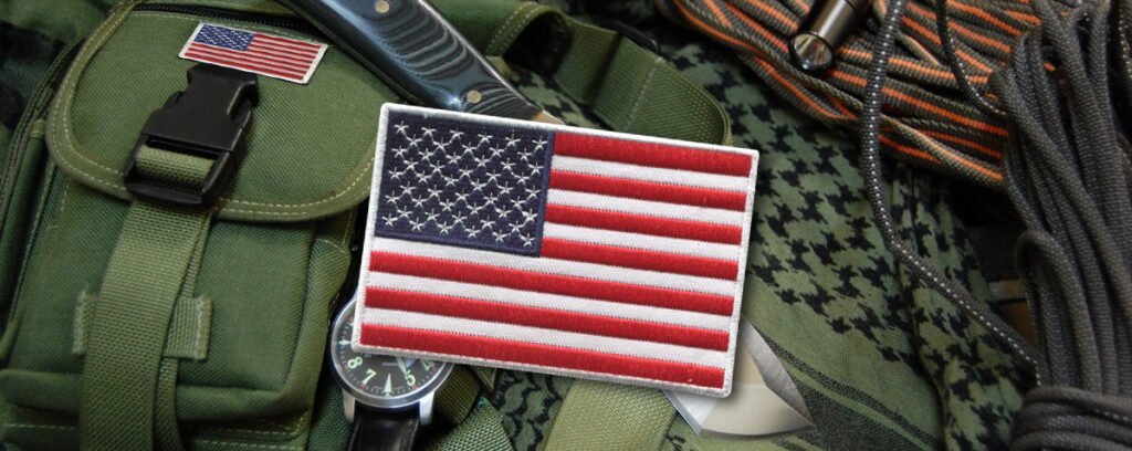 "Military Backpack with American Flag Patch and Tactical Gear"